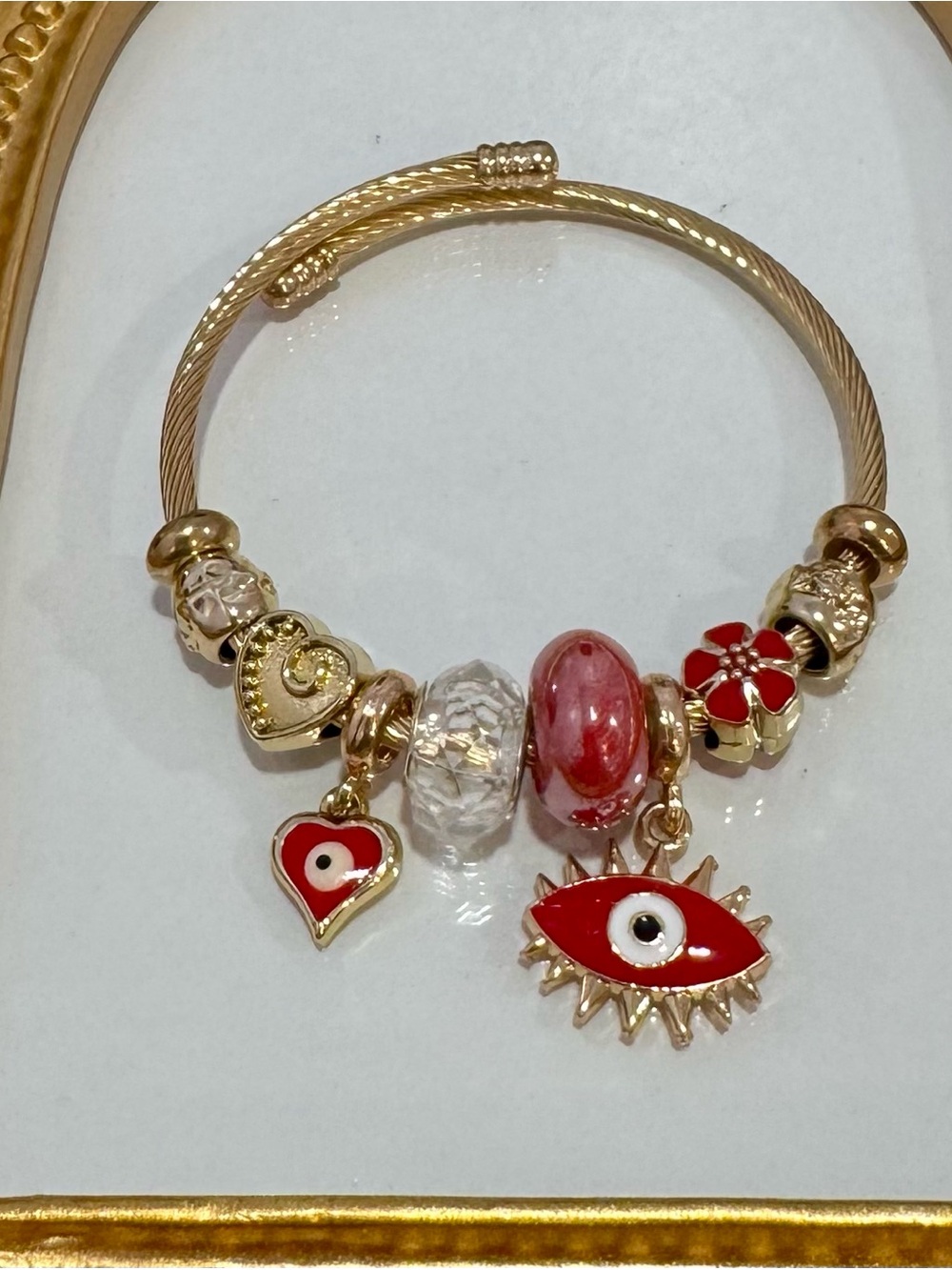 New Gold-Tone Cuff Bracelet with Red Enamel Eye & Heart Charms